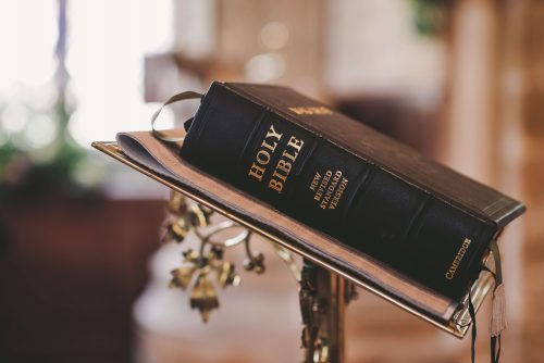 revised standard version bible on stand